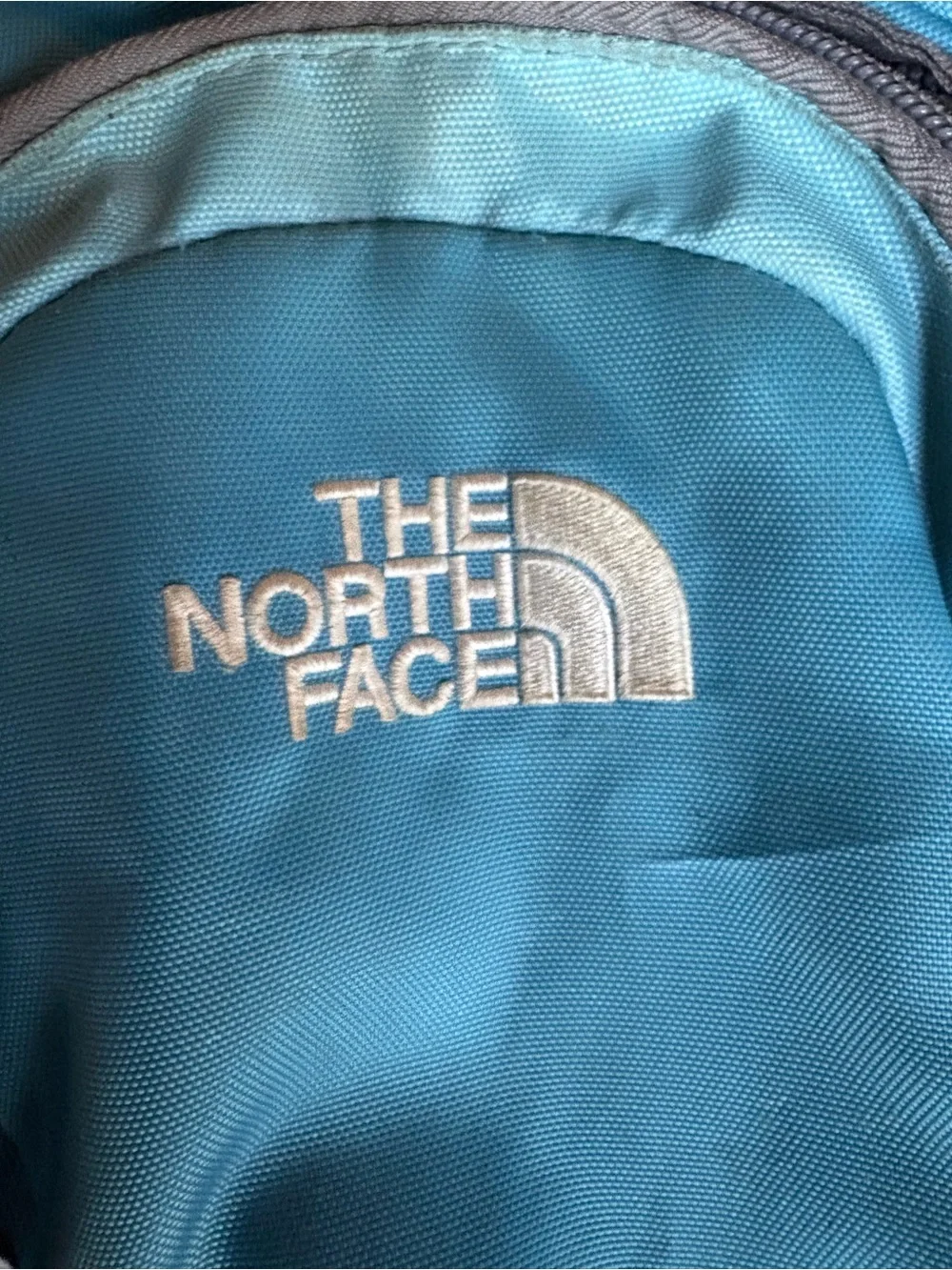 The North Face Teal and Gray Daypack Backpack